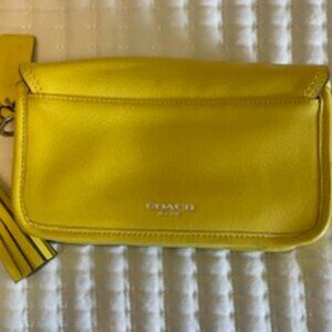 Coach Legacy Penny Crossbody bag, style 19914, with tassels and Coach hang tag.